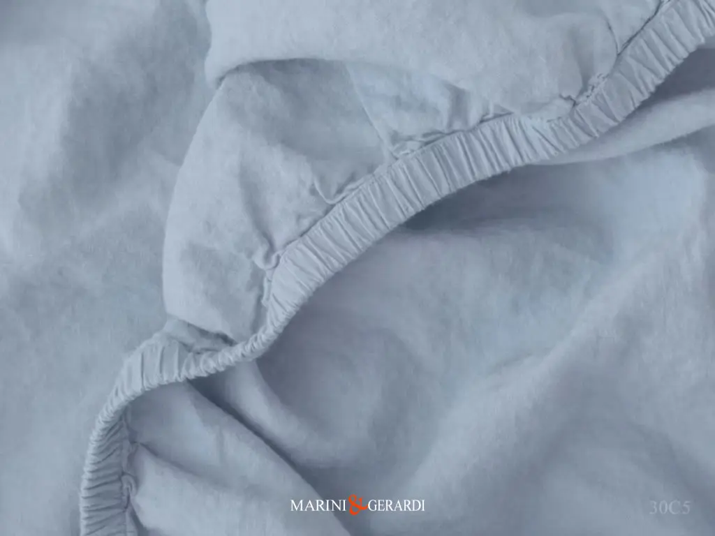 lenzuola sotto in cotone con angoli in azzurro