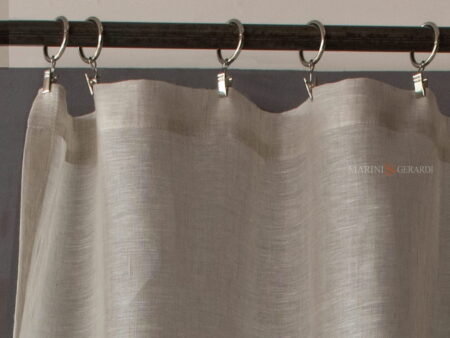Tende vetri con clips annelli metallici diametro 3,5 cm.