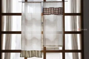 Tendina vetro tocco di sartoria italiana in arredo interni.